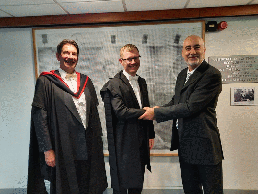 Rob Williamson pictured with internal examiner Prof. Phil Burrows and external examiner Dr. Elias Métral from CERN