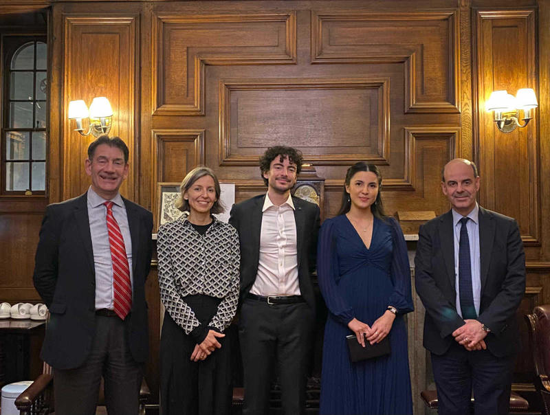 Collette Pakuza and Carlo Mussolini celebrate defending their theses