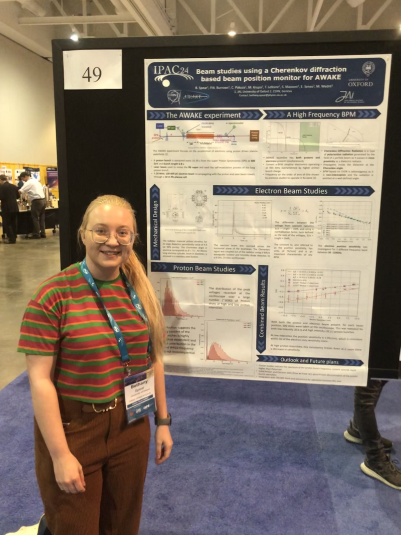 Bethany Spear presenting her poster at IPAC 2024