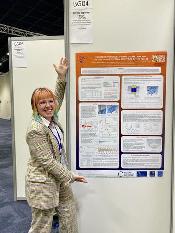 Emily Howling next to poster presentation